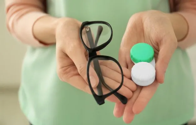 doctor-helps-patient-gives-eye-drops-How to Treat Presbyopia_ body ss