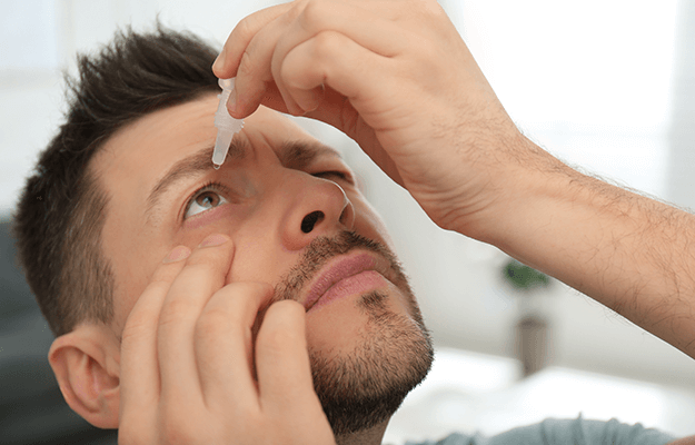 man using drops eyes home Dos and Donts When Using Eye Drops