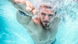 man swimming Is It Safe To Swim With Contact Lenses_ feat ss