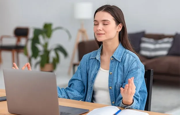 woman-meditates-takes-break-after-hard-workTry-Hard-Blinking-ss-body - How to Stop Eye Twitching